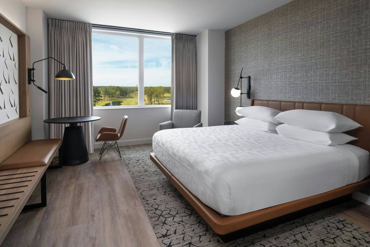 Premium bedding, down comforters, pillowtop beds, in-room safe