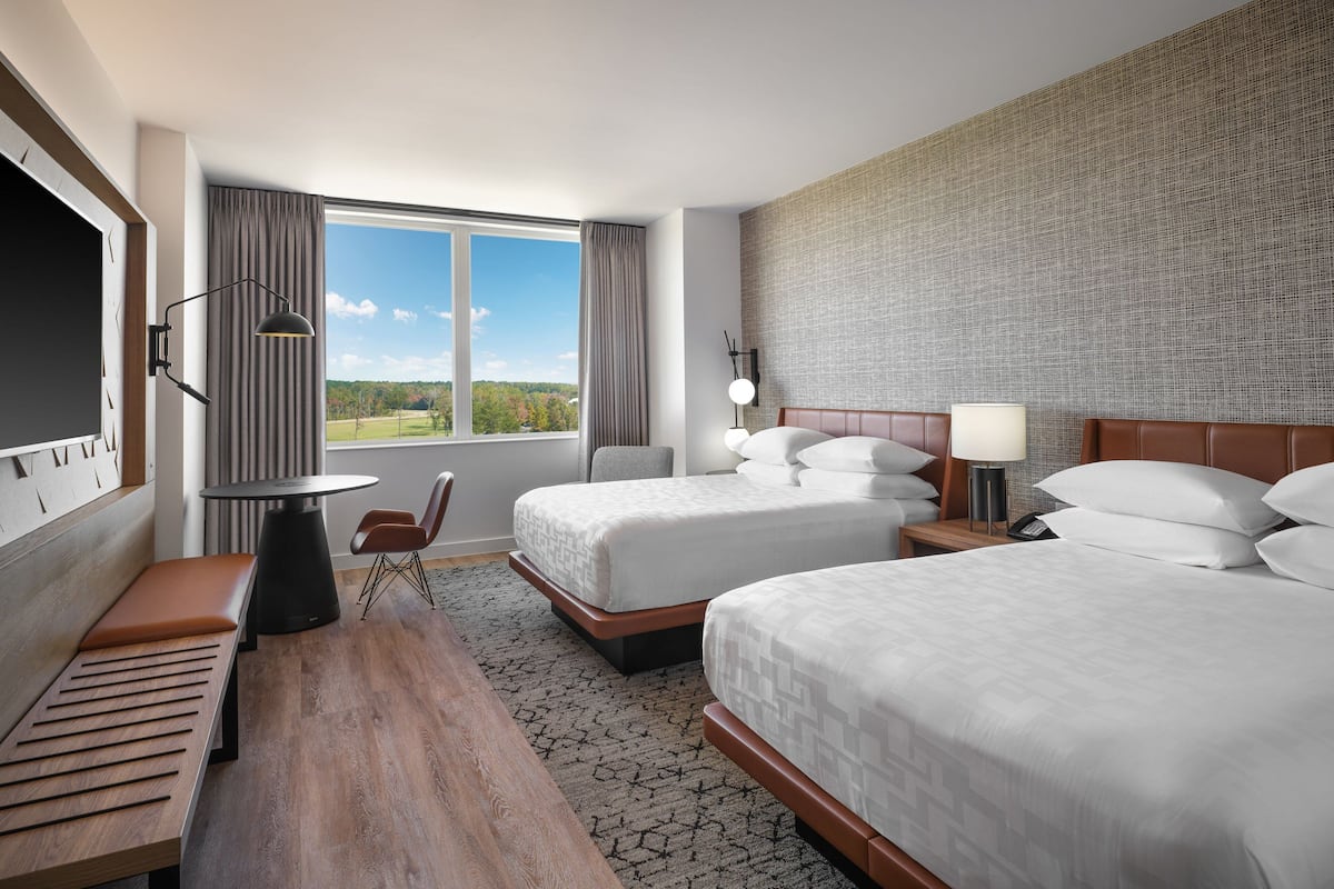 Premium bedding, down comforters, pillowtop beds, in-room safe