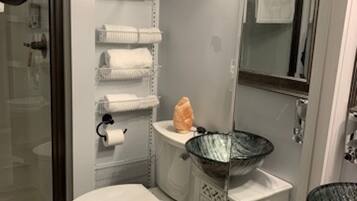 Shower, hair dryer, towels, soap