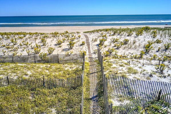 On the beach, sun-loungers, beach towels