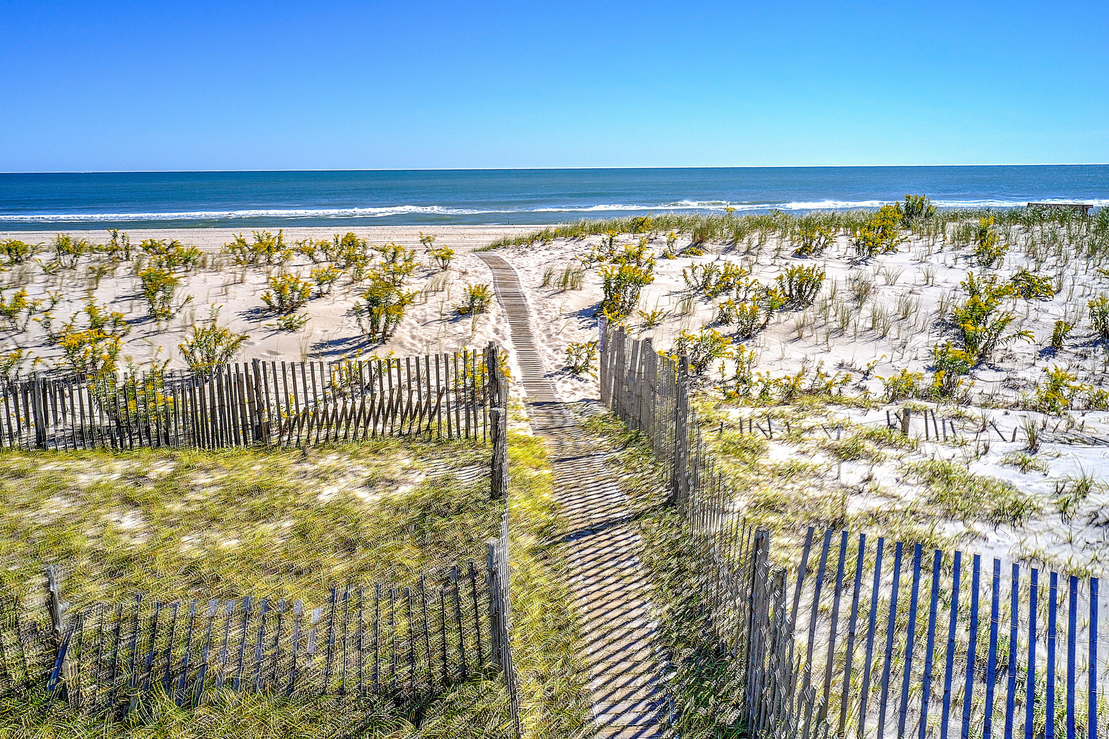 On the beach, sun loungers, beach towels