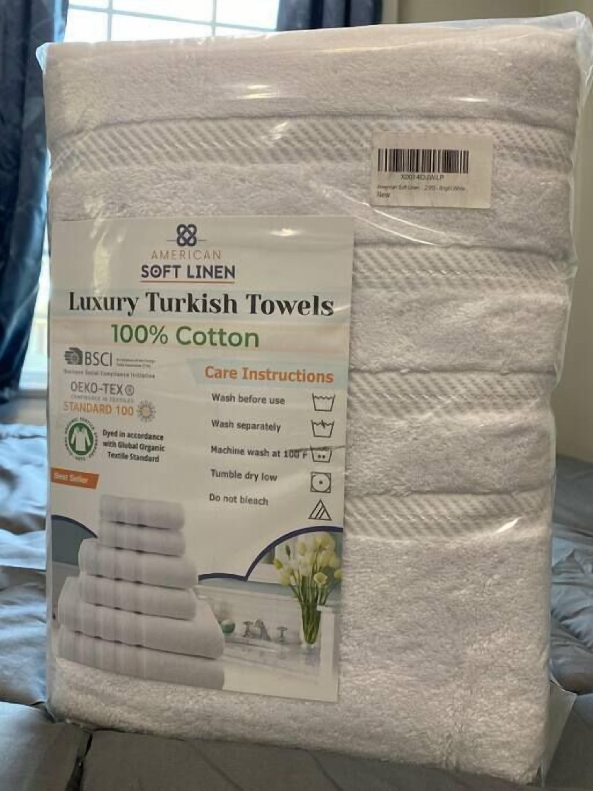 Bathtub, hair dryer, towels, shampoo