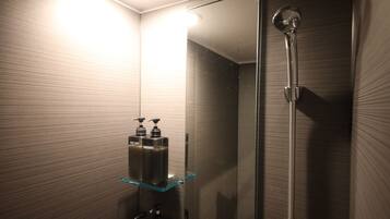 Shower, free toiletries, hair dryer, slippers