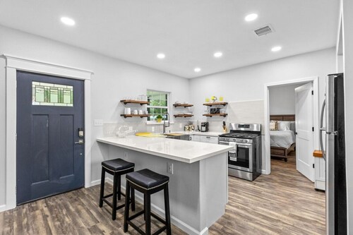 Fully renovated historic train depot bungalow in old town League City! Bright, stylish 1BR/1BA home.