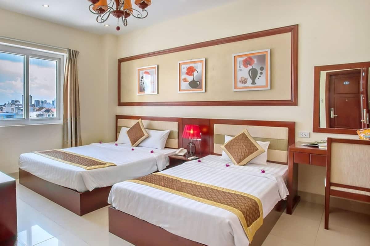Chambre Deluxe avec lits jumeaux | Minibar, bureau, chambres insonorisées, Wi-Fi gratuit