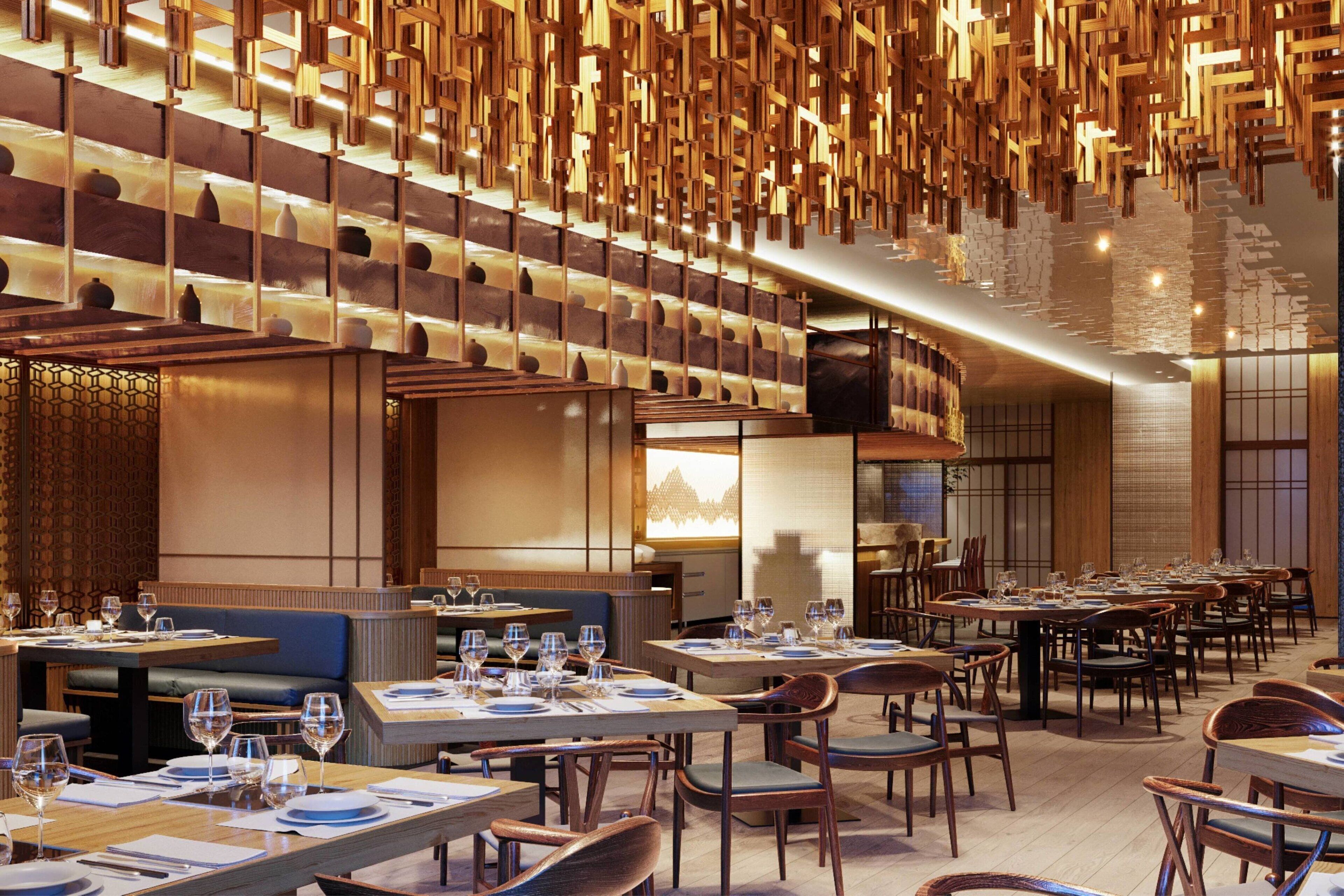 A modern restaurant with wooden decor, multiple dining tables, and a variety of seating options.
