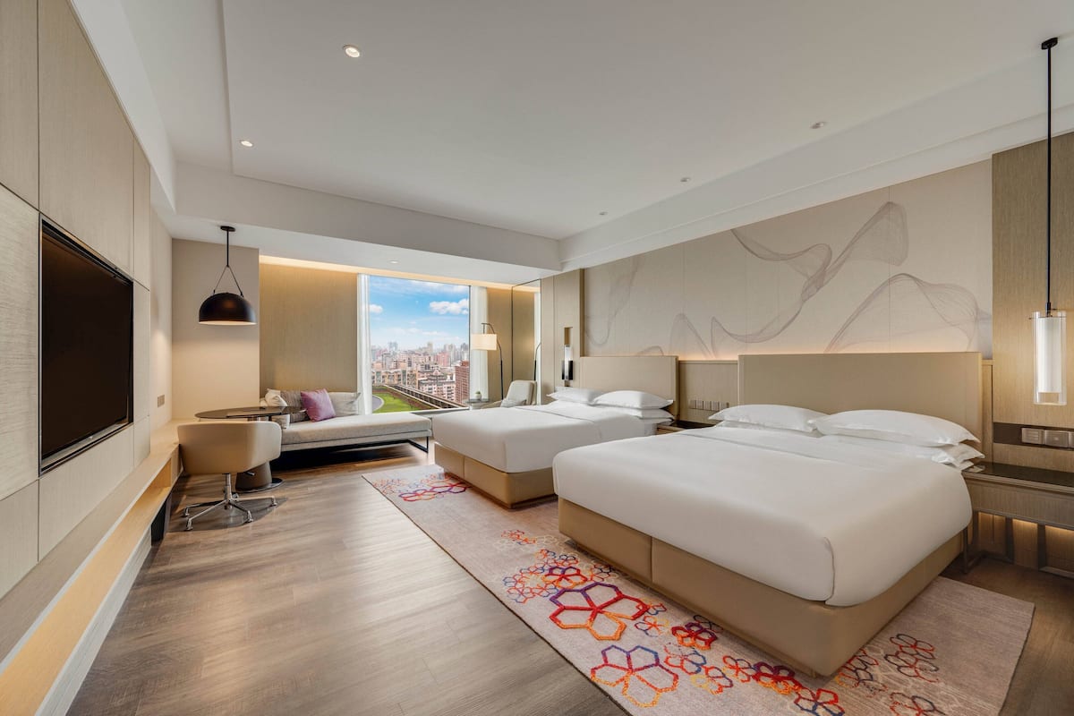 Deluxe Family Room | 1 bedroom, down duvets, in-room safe, laptop workspace