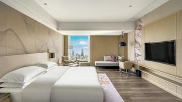 Deluxe Room, 1 King Bed, Non Smoking, City View | Down duvets, in-room safe, laptop workspace, blackout curtains