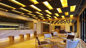 A spacious lobby with a checkered floor, modern ceiling design, and seating areas. - Onyado Nono Kanazawa Natural Hot Spring (Kanazawa)