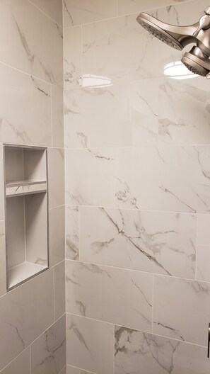 Combined shower/tub, hair dryer, towels, soap