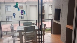 Unclassified image, 3 of 7, button - A comfortable livingroom, fully equipped kitchen make you feel at home apartment (Mossel Bay)