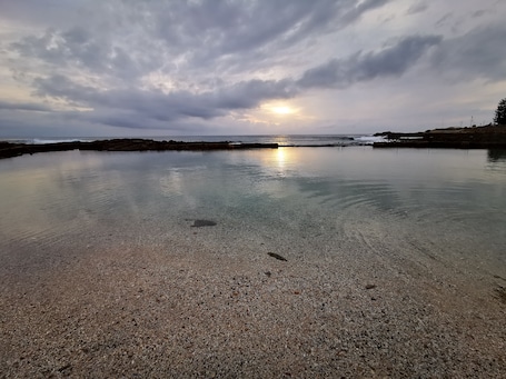 Beach. A comfortable livingroom, fully equipped kitchen make you feel at home apartment