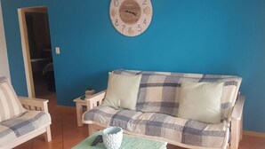 Unclassified image, 5 of 7, button - A comfortable livingroom, fully equipped kitchen make you feel at home apartment (Mossel Bay)