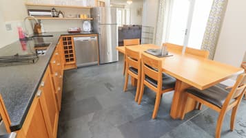 Cottage | Private kitchen | Fridge, dishwasher, cookware/dishes/utensils