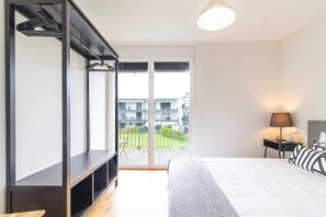 Departamento básico, 2 camas Queen size | 2 habitaciones y espacio para trabajar con laptop 