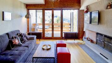 Basic Apartment, 1 Queen Bed with Sofa bed | Living area | TV, fireplace