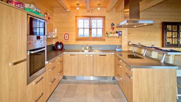 Basic Chalet, Multiple Beds | Private kitchen | Fridge, microwave, oven, stovetop