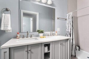 Shower, hair dryer, soap, shampoo