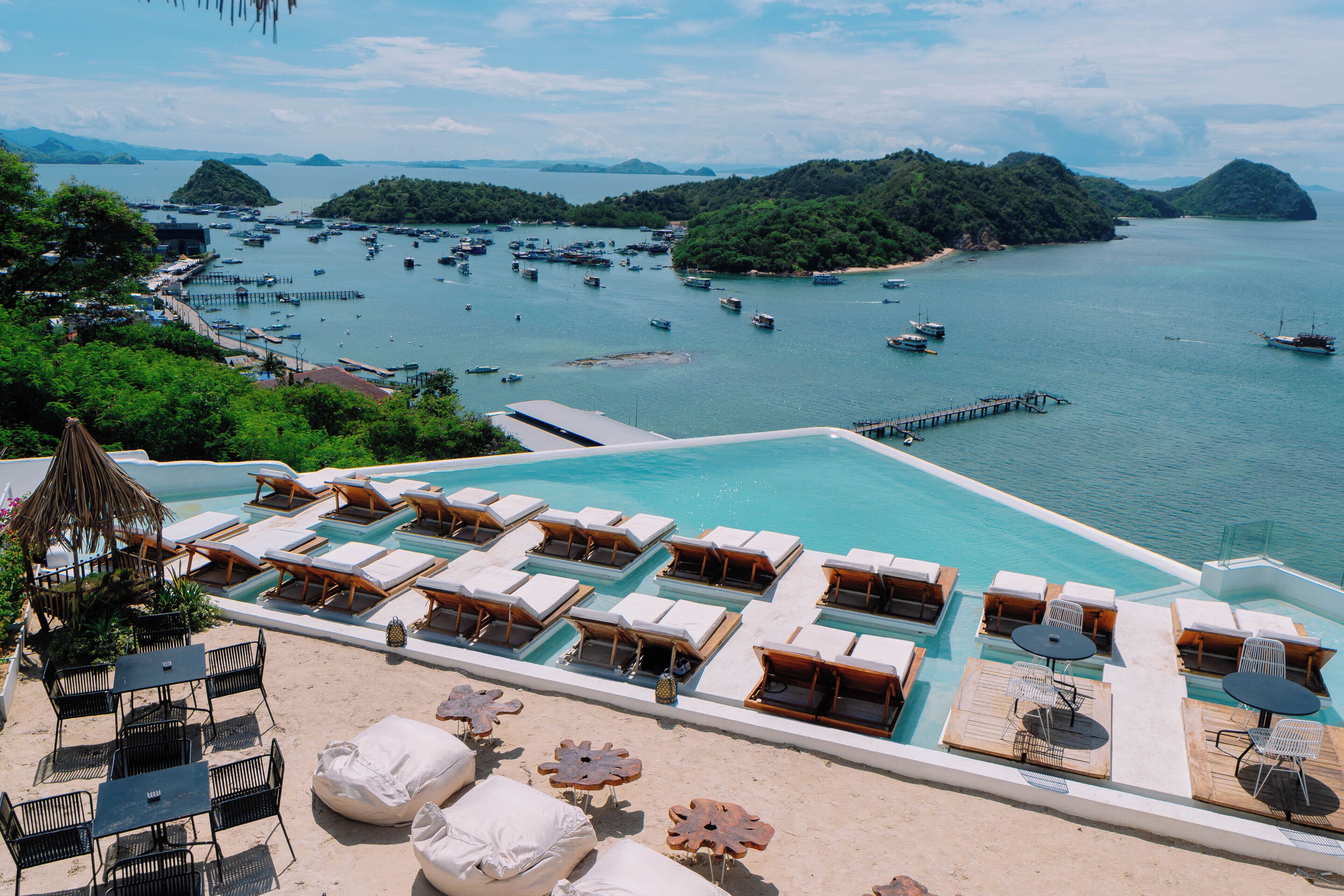 2 outdoor pools, open 8:00 AM to 8:00 PM, pool loungers