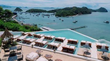 2 outdoor pools, open 8:00 AM to 8:00 PM, pool loungers