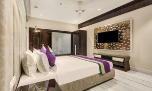 In-room safe, desk, free WiFi, bed sheets - Treebo Premium Tahoora International (Kolkata)