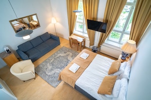 Deluxe Double or Twin Room | Desk, laptop workspace, blackout drapes, iron/ironing board