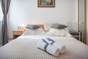 2 habitaciones, tabla de planchar con plancha y wifi gratis 