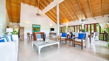Villa | Living area | 30-inch TV with digital channels