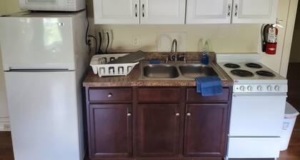 Downtown location w/ parking. Transit stop across the street. Unit 4 of 4.