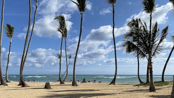 On the beach, sun loungers, beach towels
