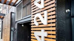 A building entrance with a sign reading "OLD WAY" and a wooden slatted design. - *New* Huge!  Spacious 3 Bedroom in Oakland that sleeps 12! over 3000+ sq ft (Pittsburgh)