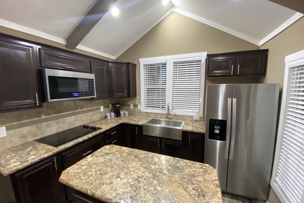 Microwave, coffee/tea maker, cookware/dishes/utensils