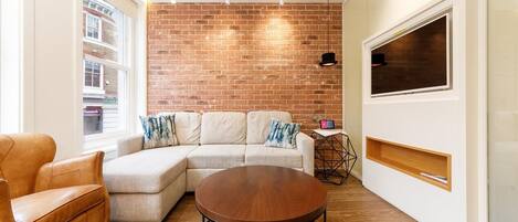 Apartment, 1 Bedroom | Living area | 32-inch Smart TV with satellite channels, TV, Netflix