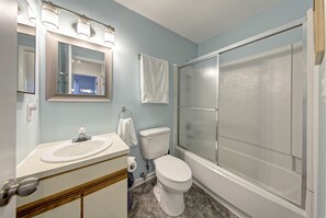 Bathtub, hair dryer, towels