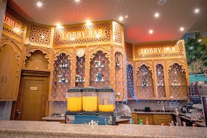 8 bars/lounges, 3 poolside bars, beach bar