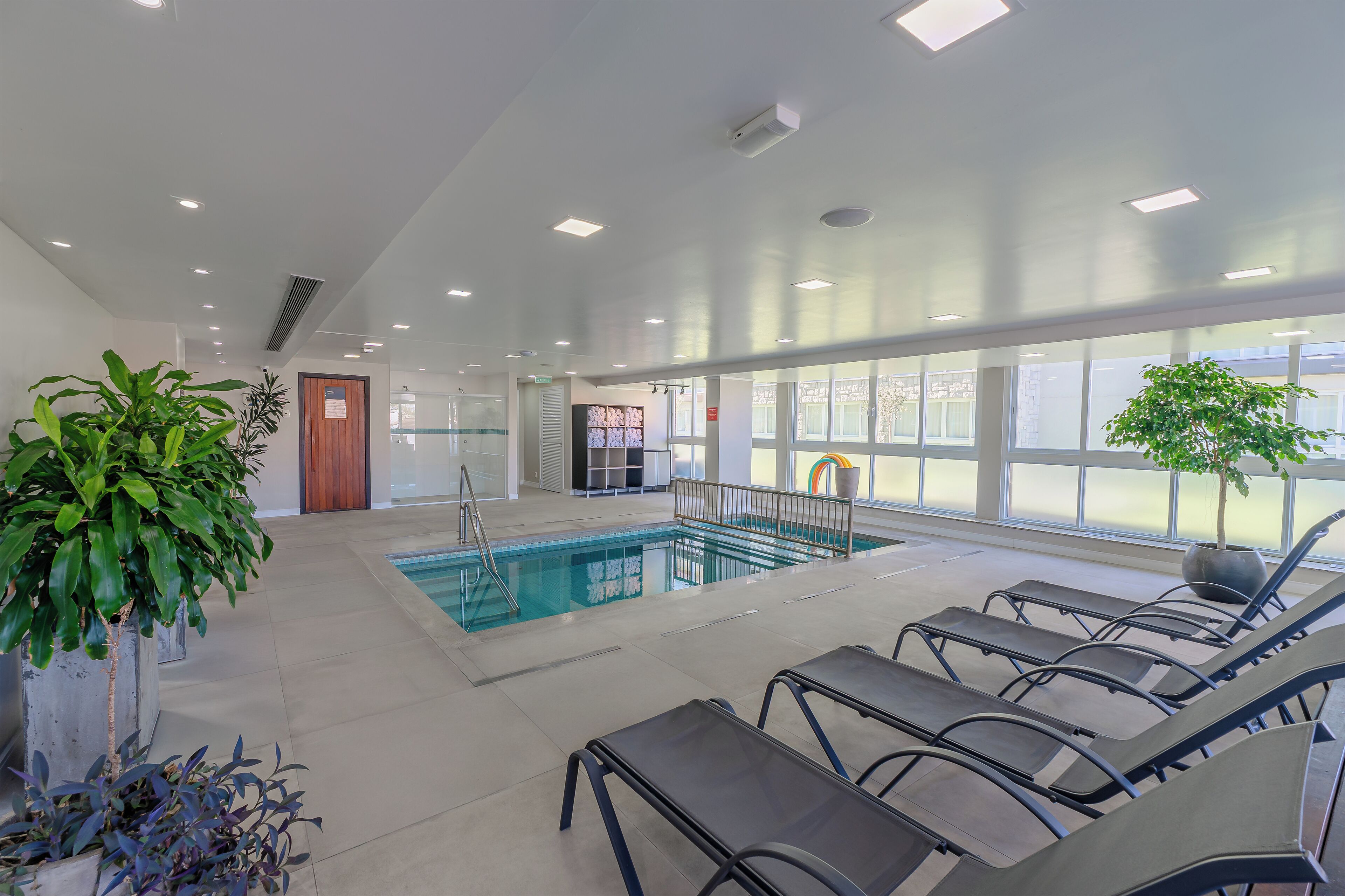 indoor pool, pool loungers