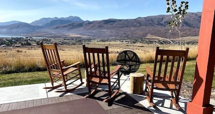 Gorgeous 5 bedroom 4.5 bath home with incredible mountain and lake views.