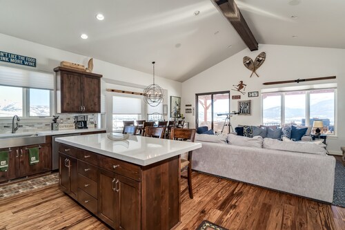 Gorgeous 5 bedroom 4.5 bath home with incredible mountain and lake views.