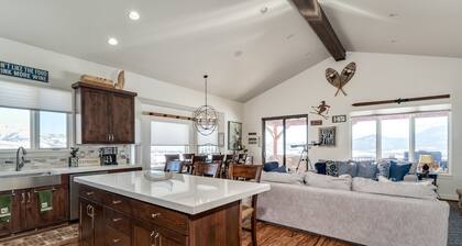 Gorgeous 5 bedroom 4.5 bath home with incredible mountain and lake views.