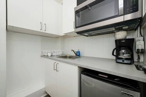 Microwave, stovetop, coffee/tea maker, toaster