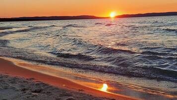 On the beach, sun loungers