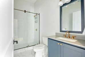 Designer toiletries, hair dryer, towels, soap