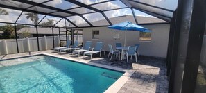 Outdoor pool, a heated pool - -Sea Coast Living At it's BEST, Heated pool, near beaches, shops, restaurants (Naples)