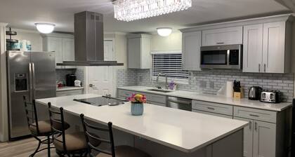 Cozy 5 Bedroom 85” TV Home in a Secluded Area