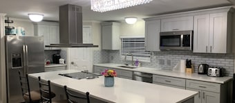 Cozy 5 Bedroom 85” TV Home in a Secluded Area