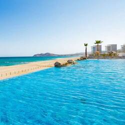 On the beach, sun loungers, beach towels