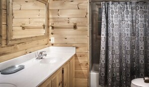 Combined shower/tub, hair dryer, towels, soap