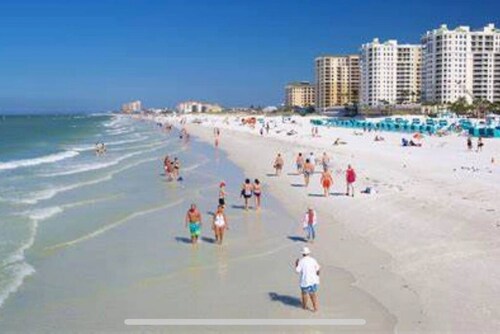 4 BR Oasis, water views every room steps to beach!