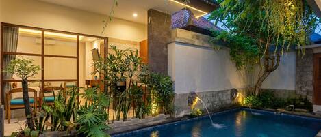 Outdoor pool, open 6:00 AM to 10:00 PM, pool umbrellas, pool loungers