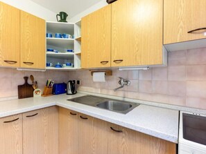 Fridge, microwave, oven, cookware/dishes/utensils